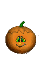 child playing with a jack-o'-lantern